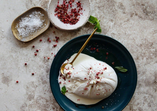Maplebrook Farm Burrata Cheese with cracked red peppercorn and sea salt