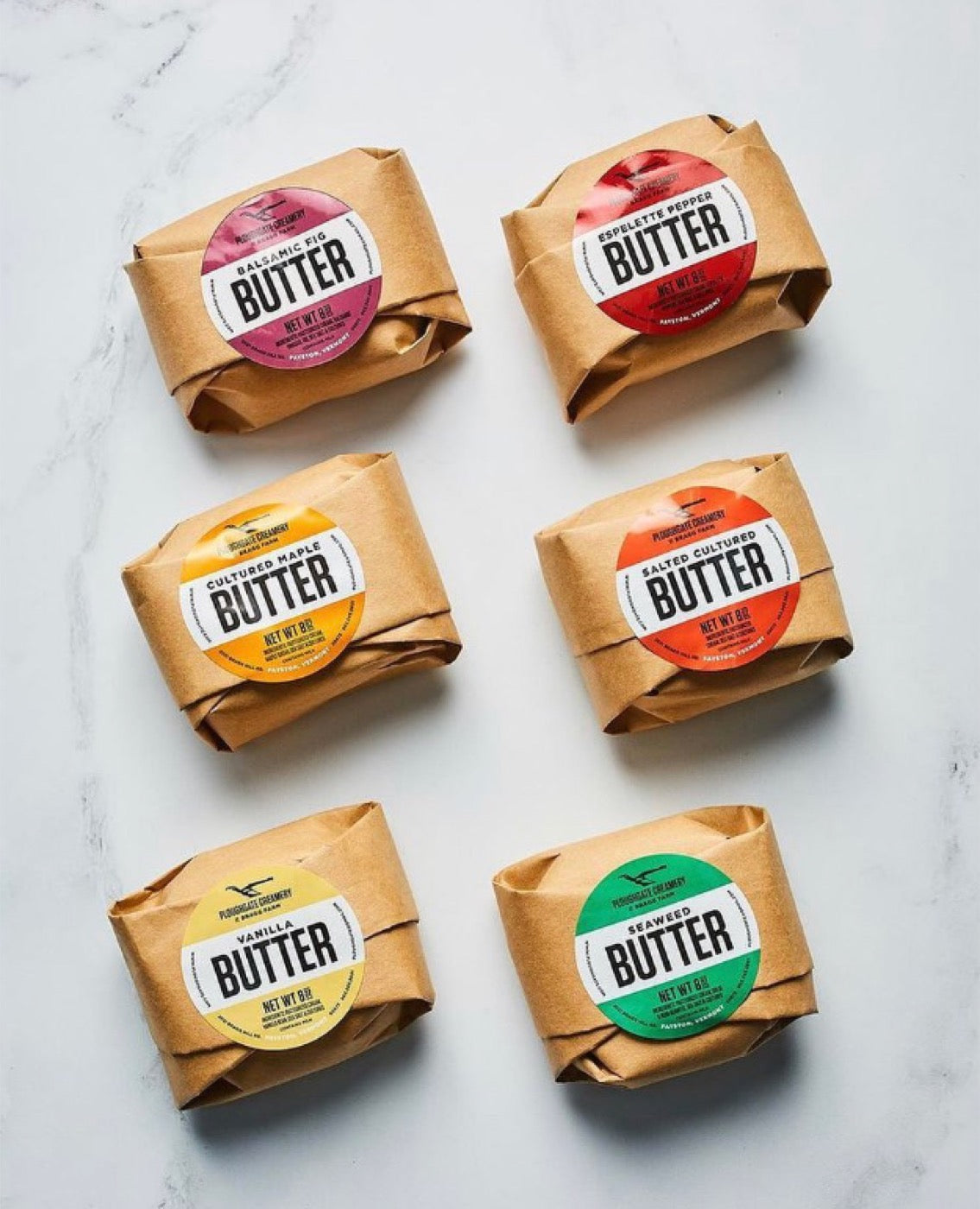 Six Ploughgate cultured butter flavors wrapped in kraft paper